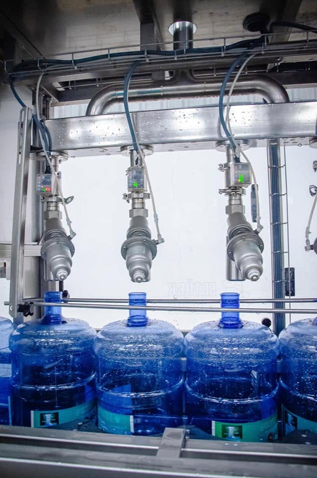 Automated bottle filling line at the Cheers factory